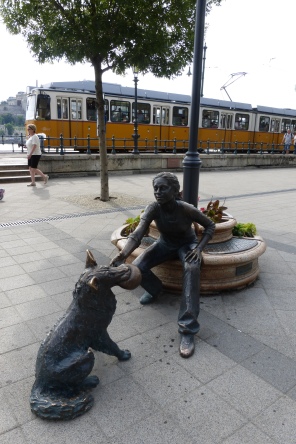 Girl With Her Dog statue - and tram #2